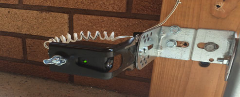 Garage door safety sensor